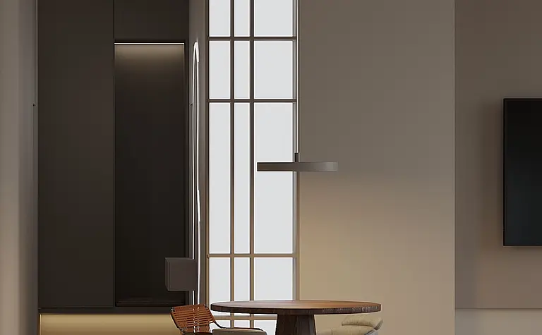 Nowoczesne wnętrze z drewnianym stołem i szarymi krzesłami, oświetleniem i dużymi oknami.