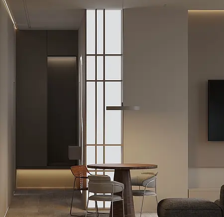 Nowoczesne wnętrze z drewnianym stołem i szarymi krzesłami, oświetleniem i dużymi oknami.