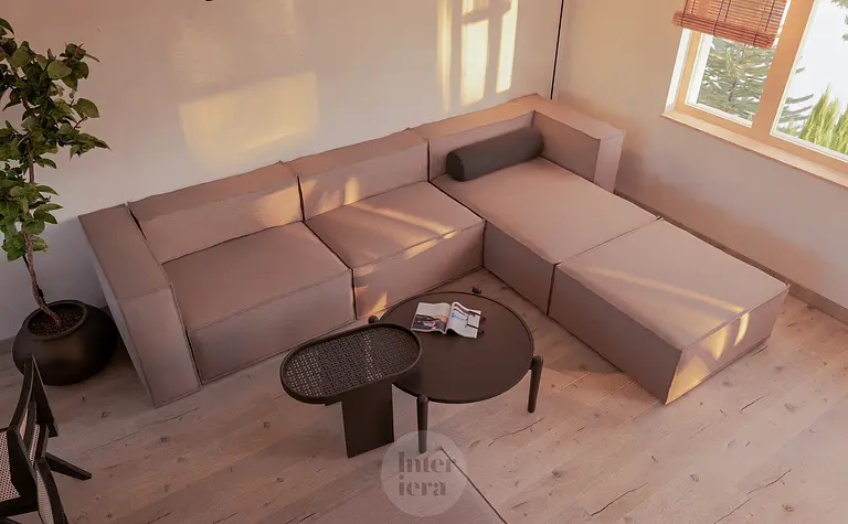 Wnętrze salonu w stylu japandi i minimalistycznym z beżową sofą i drewnianymi akcentami.