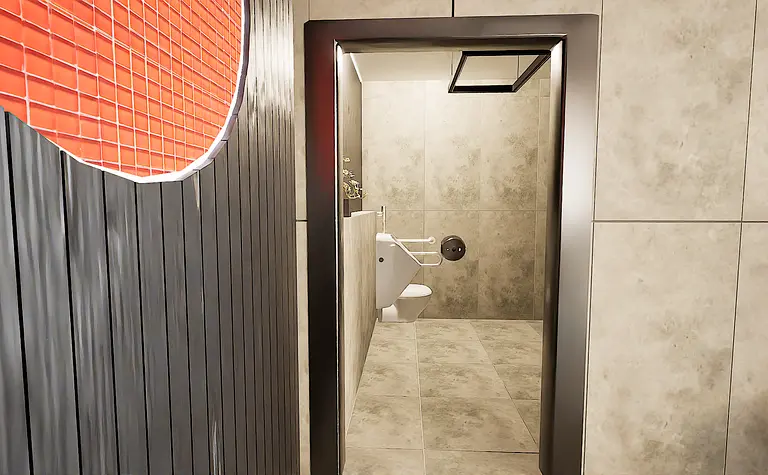 Wnętrze łazienki z szarymi płytkami, białym WC, minimalistyczne, nowoczesne.