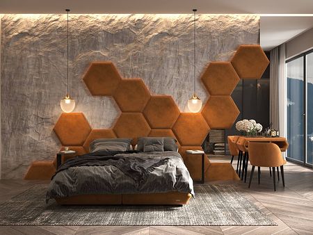 Sypialnia z nowoczesnym łóżkiem, hexagonalnymi akcentami oraz przytulnymi dodatkami.