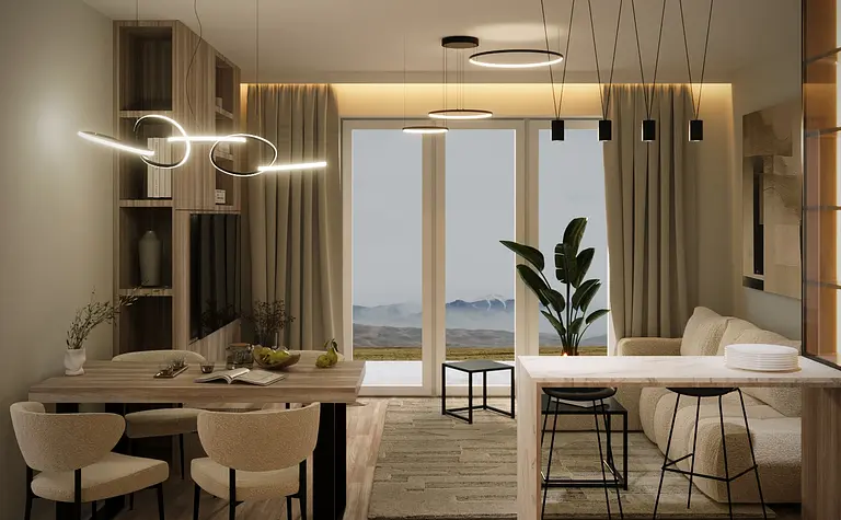 Wnętrze jadalni z drewnianym stołem, jasnymi krzesłami i nowoczesnym oświetleniem.