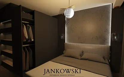 Sypialnia w stylu industrialnym z minimalistycznym oświetleniem i rustykalnymi detalami.