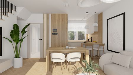 Wnętrze kuchni boho-japandi z drewnianymi akcentami i roślinami.