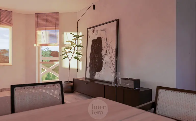 Wnętrze w stylu japandi i minimalistycznym z rośliną i dużym obrazem na ścianie.