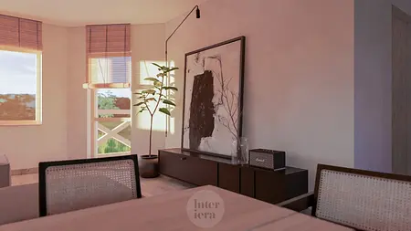 Wnętrze w stylu japandi i minimalistycznym z rośliną i dużym obrazem na ścianie.