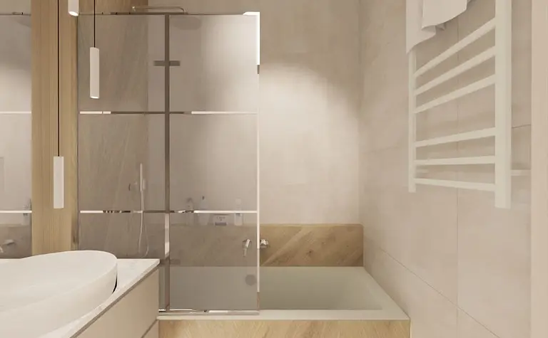 Wnętrze łazienki z minimalistycznym designem, drewnianymi elementami i wanną.