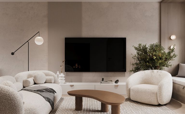 Wnętrze salonu w stylu boho z minimalistycznymi meblami i nowoczesnymi akcentami.