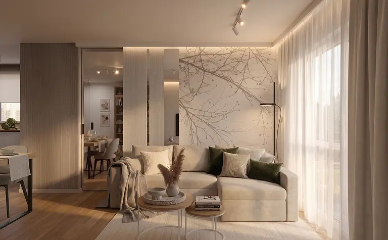 Wnętrze salonu w stylu skandynawskim z jasnymi meblami i roślinami.