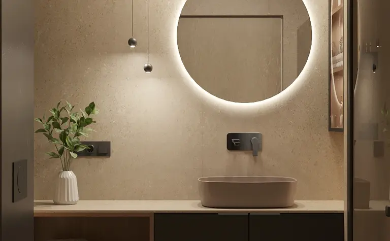 Nowoczesna łazienka z okrągłym lustrem, minimalistycznym designem i naturalnymi materiałami.