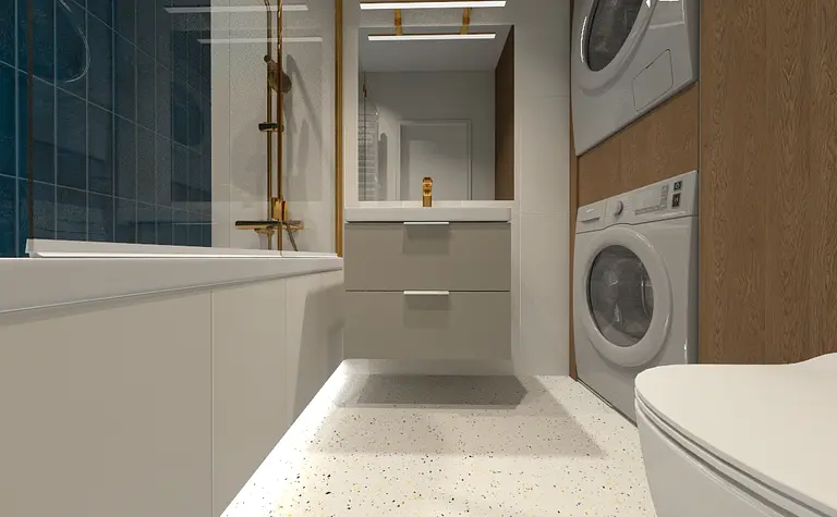 Współczesna łazienka z szarymi meblami i pralką.