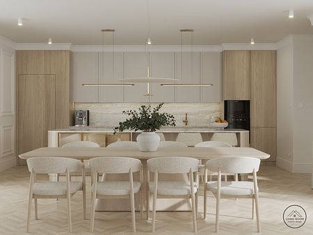 Nowoczesna kuchnia w stylu glamour z drewnianym blatem i jasnymi meblami.