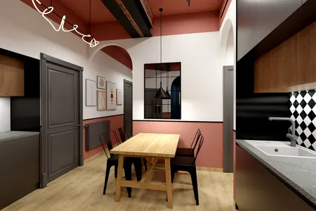 Wnętrze kuchni z drewnianym stołem, czarnymi krzesłami i akcentami dopamine decor.
