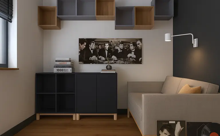 Minimalistyczne wnętrze z szaro-beżową sofą, ciemnym regałem i drewnianą podłogą.