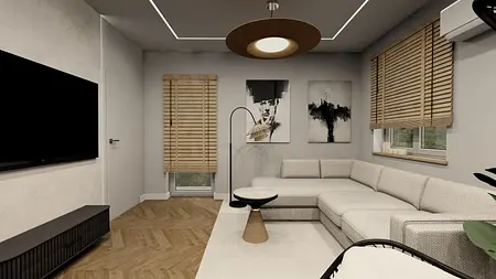 Wnętrze salonu z minimalistycznym, nowoczesnym stylem, szarymi ścianami i jasną sofą.