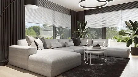 Nowoczesny salon z szarym narożnikiem, oknami i roślinami