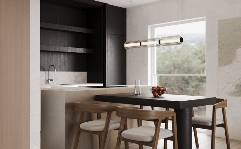 Wnętrze kuchni z minimalistycznym stylem, nowoczesnymi meblami i elementami quiet luxury.