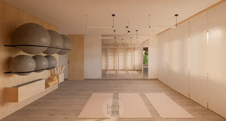 Przestronny pokój do ćwiczeń w stylu japandi i minimalistycznym z drewnianymi detalami.