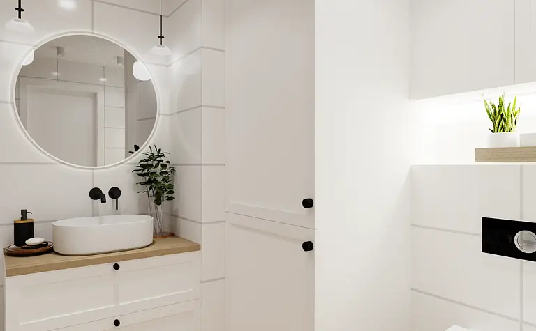 Wnętrze łazienki w stylu skandynawskim z białymi ścianami i drewnianymi meblami.