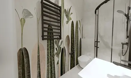 Wnętrze łazienki z roślinnym muralem oraz nowoczesnymi elementami