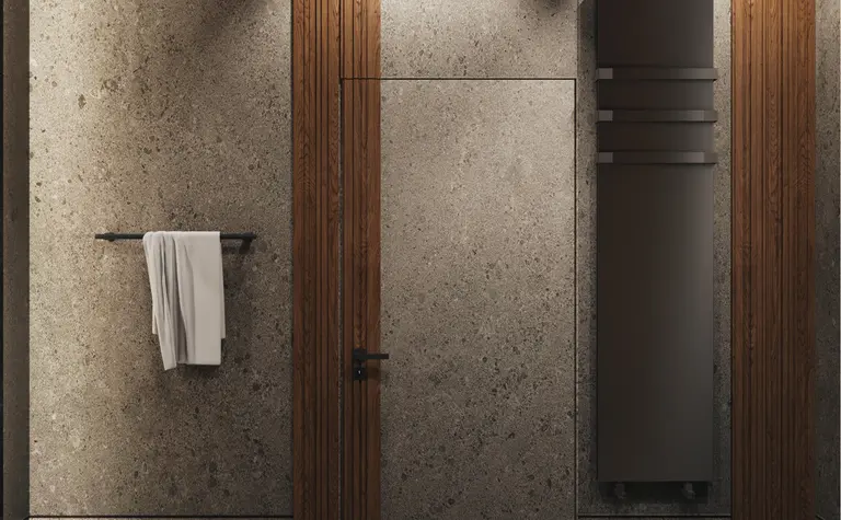 Nowoczesna łazienka z szarymi ścianami, drewnianymi detalami, minimalistyczny design.