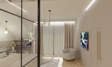 Wnętrze sypialni z beżowym łóżkiem, białymi zasłonami, telewizorem i stylowymi akcentami glamour.