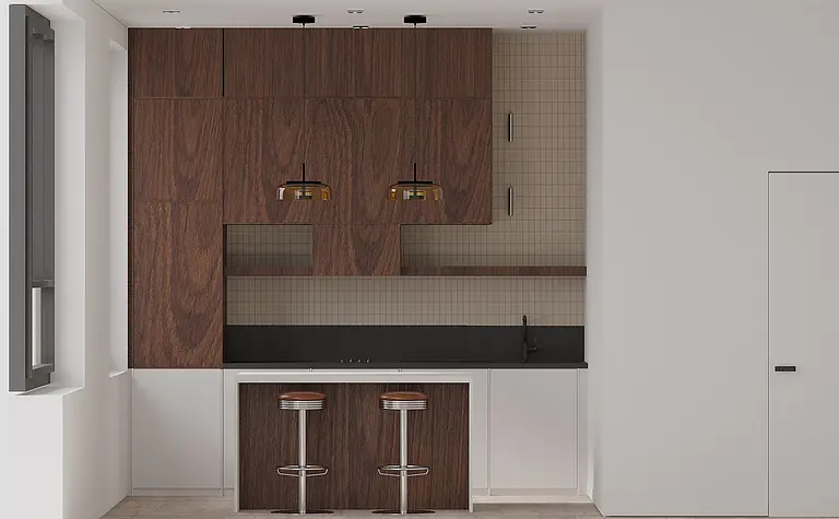 Wnętrze kuchni z drewnianymi meblami, czarnym blatem i nowoczesnym oświetleniem.