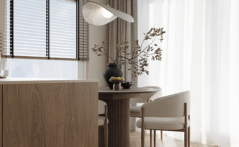 Wnętrze jadalni w stylu japandi i minimalistycznym z drewnianym stołem i roślinnością.