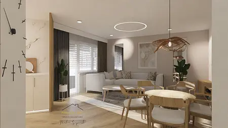 Styl minimalistyczny, przestronny salon z jasnymi meblami i drewnianym stołem.