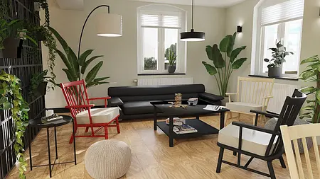 Wnętrze salonu z roślinami, czarną sofą i czerwonym fotelem, styl boho i skandynawski.