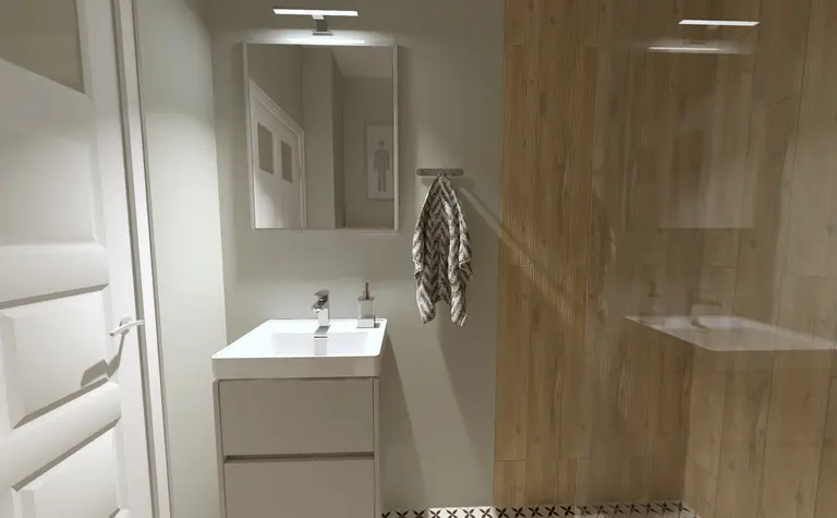 Współczesna łazienka z białą umywalką, lustrem i drewnianymi detalami.