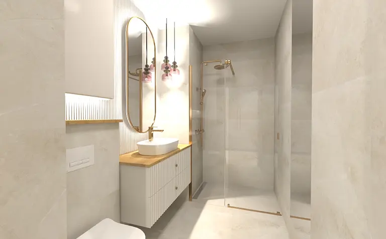 Współczesna łazienka z białą umywalką, szklanym prysznicem i złotymi akcentami.