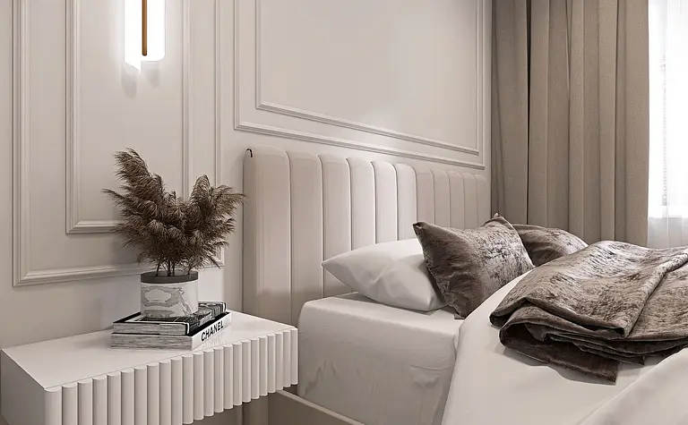 Wnętrze sypialni z nowoczesnym łóżkiem i minimalistycznymi dodatkami.