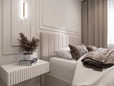 Wnętrze sypialni z nowoczesnym łóżkiem i minimalistycznymi dodatkami.