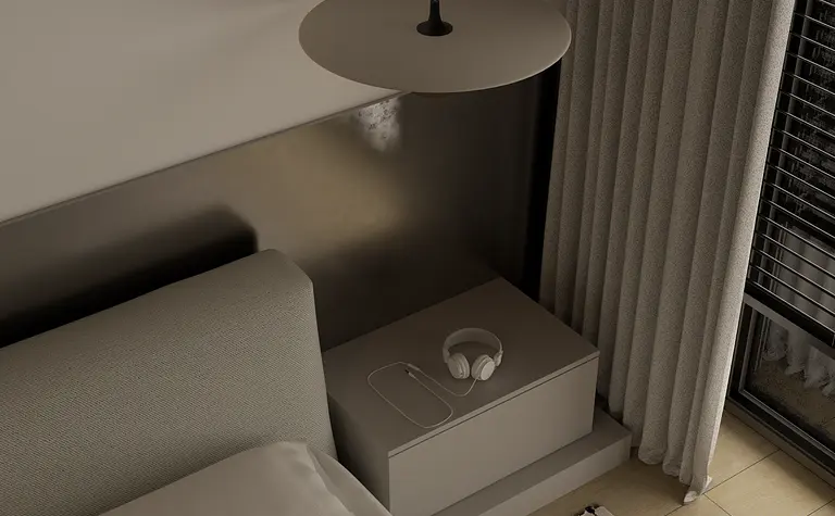 Sypialnia w minimalistycznym stylu z szarym łóżkiem i nowoczesnym oświetleniem.