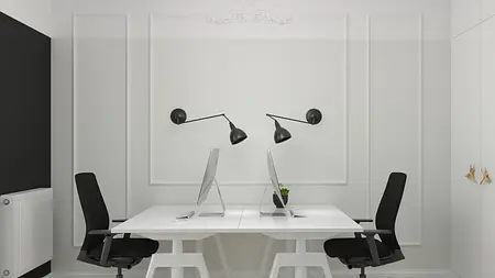 Wnętrze gabinetu z białymi meblami, czarnymi lampami i minimalistycznym designem.
