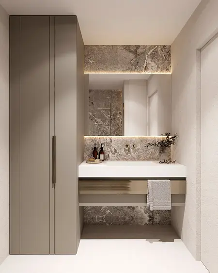 Nowoczesna łazienka w stylu minimalistycznym z szarymi meblami i eleganckimi akcentami.