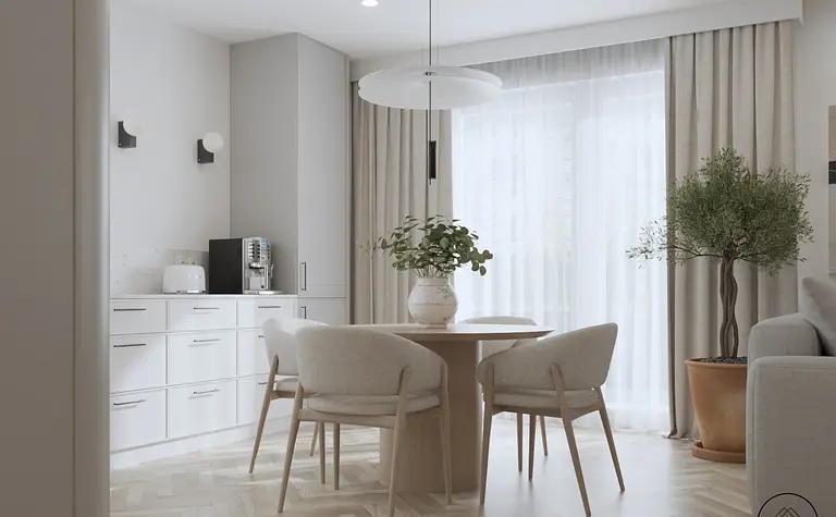 Jadalnia w stylu minimaluxe z białym stołem, szarymi krzesłami i roślinnością