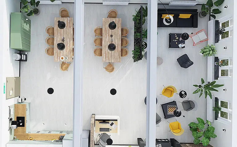 Wnętrze jadalni z dużym drewnianym stołem, zieloną szafką, roślinami i nowoczesnymi akcentami.