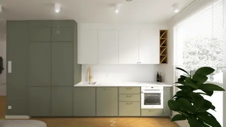 Wnętrze kuchni w stylu art deco, boho i eklektycznym, z zielonymi meblami i białym blatem.