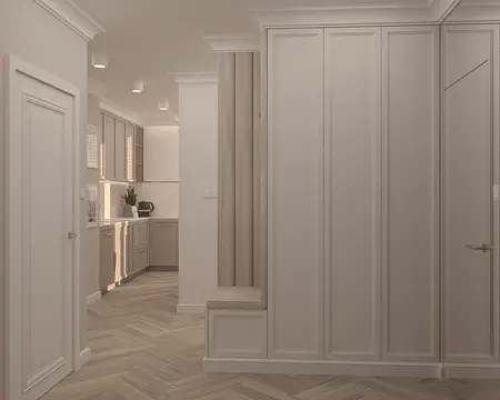 Wnętrze nowoczesnej kuchni w stylu quiet luxury z beżowymi meblami.