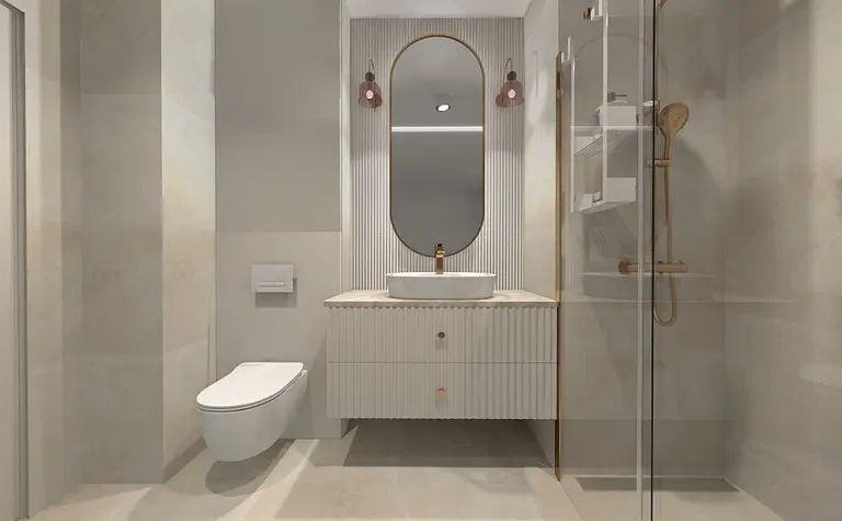 Wnętrze łazienki z nowoczesną umywalką i szklanym prysznicem