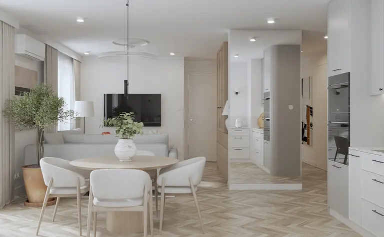 Wnętrze kuchni w stylu minimaluxe, nowoczesne z beżowymi meblami i drewnianym stołem.