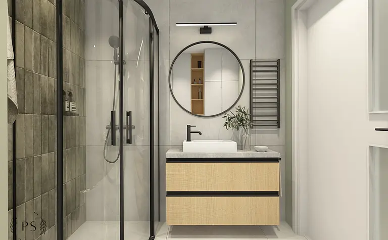 Wnętrze łazienki z minimalistycznym prysznicem, nowoczesną umywalką i skandynawskim akcentem.