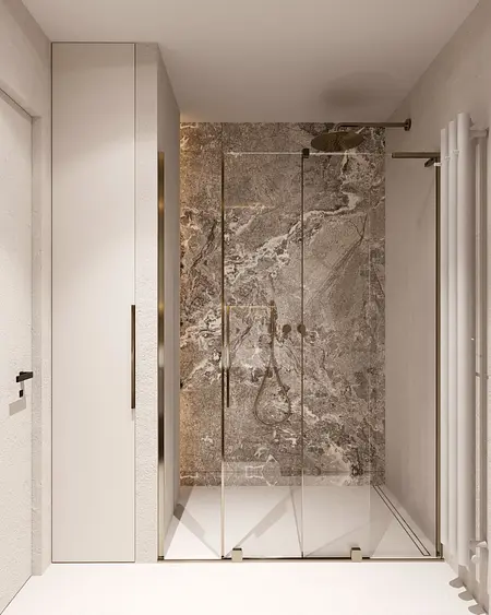 Nowoczesna łazienka z minimalistycznym prysznicem i glamour detalami.