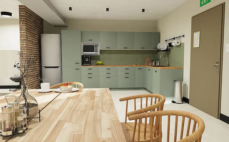 Kuchnia z zielonymi meblami, drewnianym blatem i ceglaną ścianą w stylu boho i minimalistycznym.