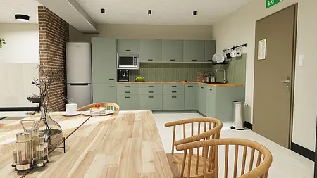 Kuchnia z zielonymi meblami, drewnianym blatem i ceglaną ścianą w stylu boho i minimalistycznym.