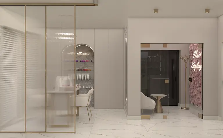 Wnętrze salonu w stylu glamour i nowoczesnym, z białymi meblami i eleganckimi detalami.