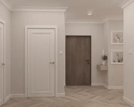 Przedpokój w stylu quiet luxury z białymi ścianami i drewnianymi akcentami.