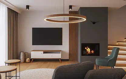 Minimalistyczny salon z kominkiem, szarym sofą i drewnianymi akcentami.